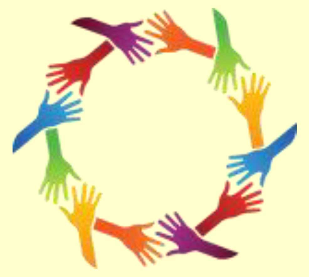 Multi-colored hands in a circle.